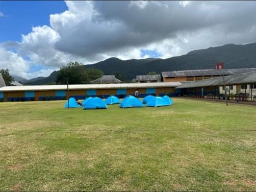 Scouts tent in an open field