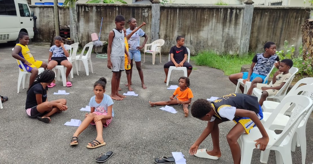 Mahe scouts having solar activities with kids with special needs