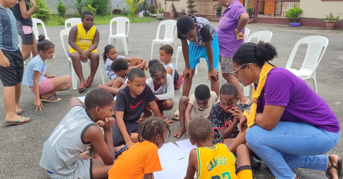 Mahe scouts having solar activities with kids with special needs